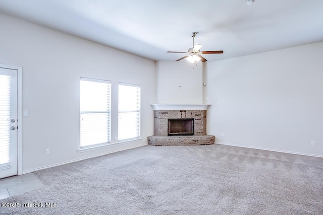 3404 Saratoga Ave, Lubbock, TX 79407 - unfurnished living room with carpet, ceiling fan, and plenty of natural light