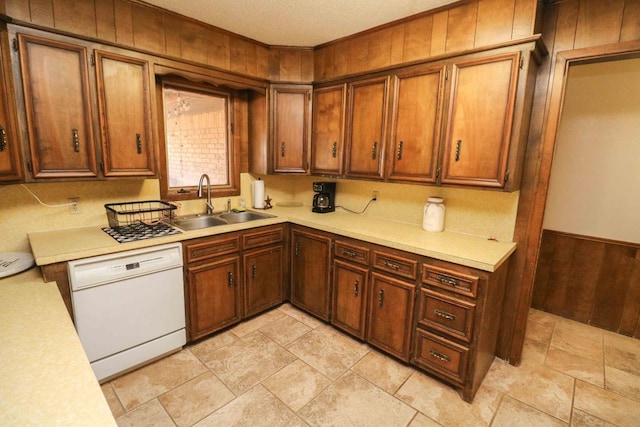 kitchen with white dishwasher and sink