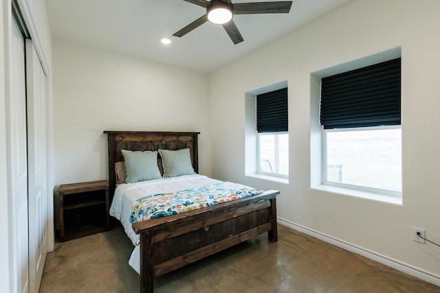 bedroom featuring concrete floors and ceiling fan