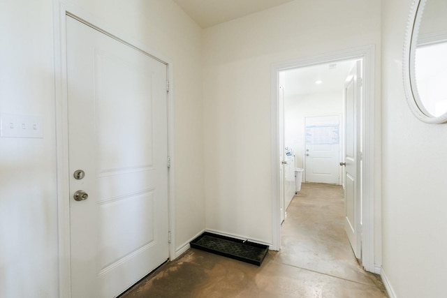 entryway featuring concrete floors