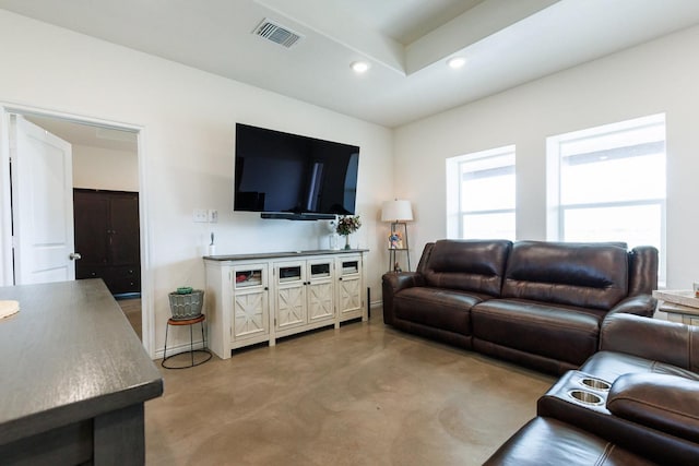 living room with concrete floors