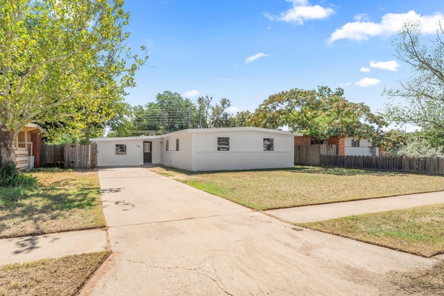 view of front of home with a front yard