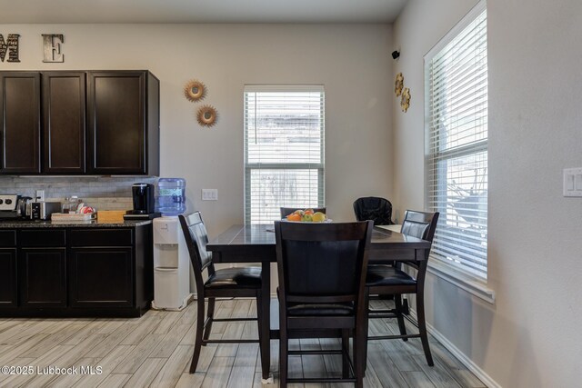 10423 Winfield Ave, Lubbock, TX 79424 - dining room featuring light wood finished floors and baseboards