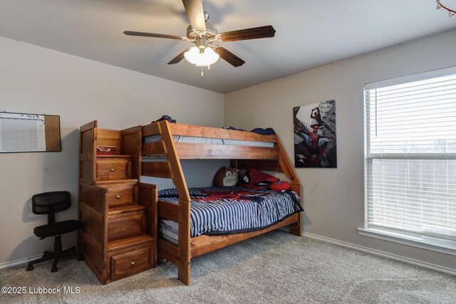 10423 Winfield Ave, Lubbock, TX 79424 - carpeted bedroom featuring baseboards and a ceiling fan