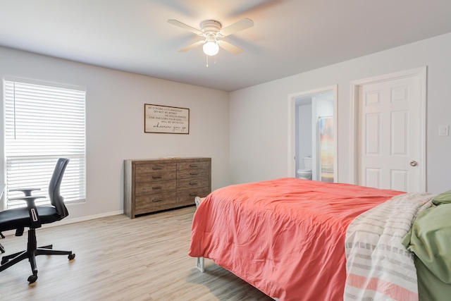 8413 10th Pl, Lubbock, TX 79416 - bedroom with light wood-style flooring, baseboards, connected bathroom, and a ceiling fan