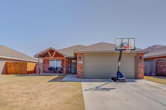 8413 10th Pl, Lubbock, TX 79416 - ranch-style house with brick siding, driveway, a garage, and a shingled roof