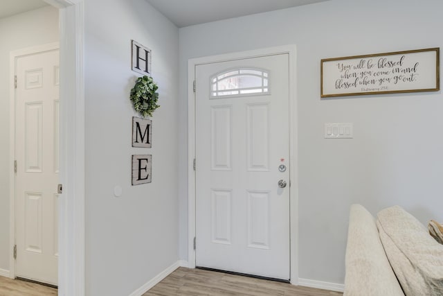 8413 10th Pl, Lubbock, TX 79416 - foyer entrance featuring light wood-type flooring and baseboards