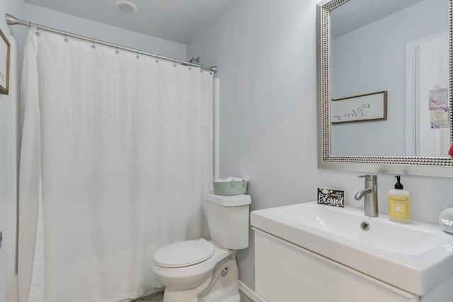 8413 10th Pl, Lubbock, TX 79416 - bathroom with toilet, vanity, and a shower with curtain