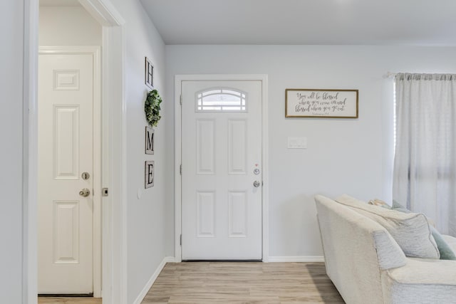 8413 10th Pl, Lubbock, TX 79416 - foyer entrance featuring light wood finished floors and baseboards