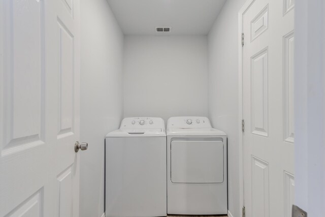 8413 10th Pl, Lubbock, TX 79416 - laundry room with washer and dryer