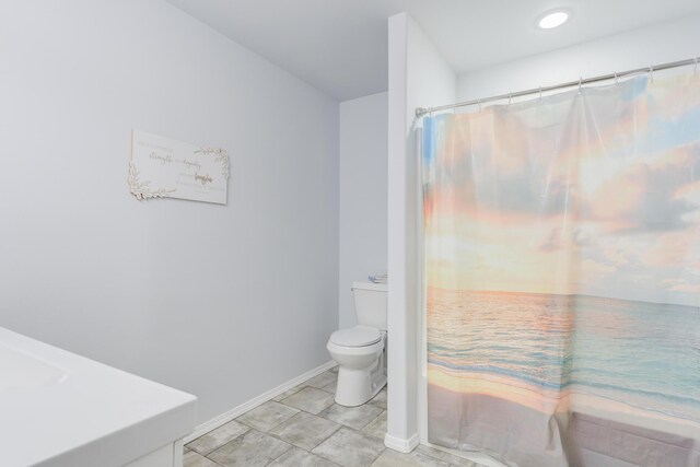8413 10th Pl, Lubbock, TX 79416 - full bathroom with toilet, baseboards, and a shower with shower curtain