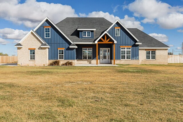 craftsman inspired home with a front yard