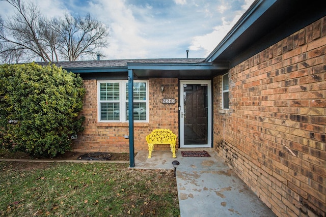 doorway to property featuring a patio area