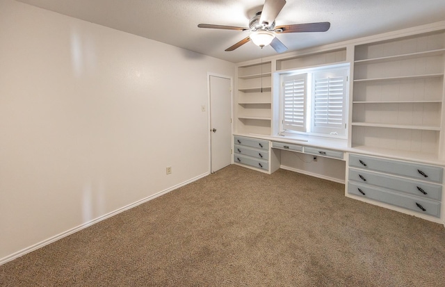 unfurnished bedroom with a textured ceiling, ceiling fan, and carpet flooring