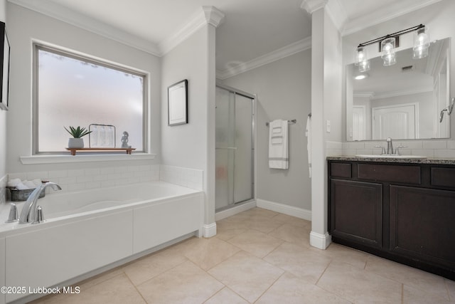 3634 Ridgely Ave, Lubbock, TX 79407 - bathroom featuring a stall shower, a garden tub, vanity, healthy amount of natural light, and ornamental molding