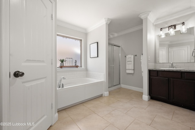 3634 Ridgely Ave, Lubbock, TX 79407 - full bath with a garden tub, a stall shower, vanity, crown molding, and tile patterned floors