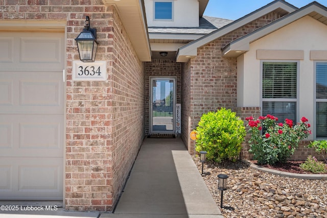 3634 Ridgely Ave, Lubbock, TX 79407 - property entrance with brick siding and a shingled roof