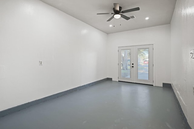 unfurnished room featuring french doors and ceiling fan