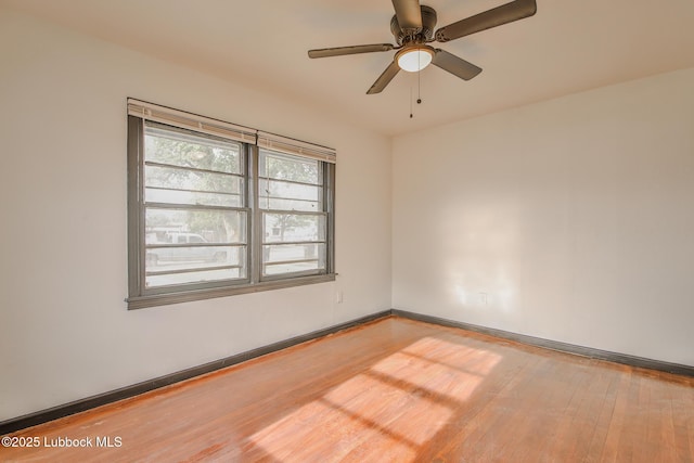 2014 60th St, Lubbock, TX 79412 - spare room with wood finished floors and ceiling fan