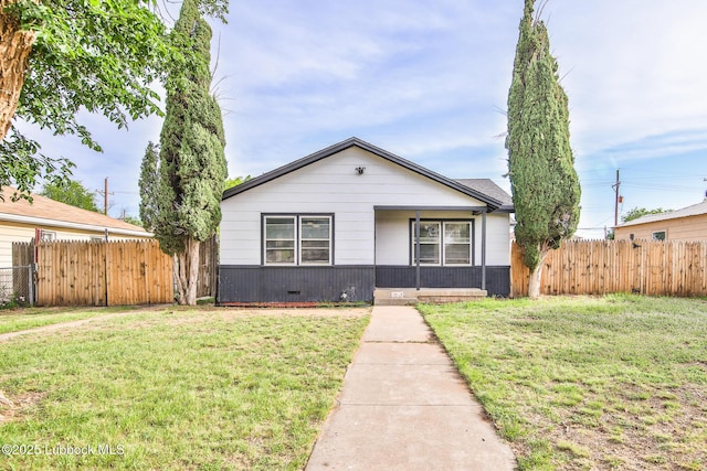 2014 60th St, Lubbock, TX 79412 - view of front facade featuring crawl space and covered porch