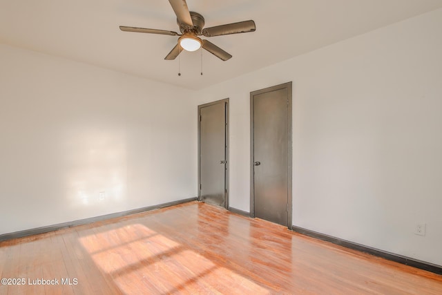 2014 60th St, Lubbock, TX 79412 - empty room featuring wood finished floors and ceiling fan