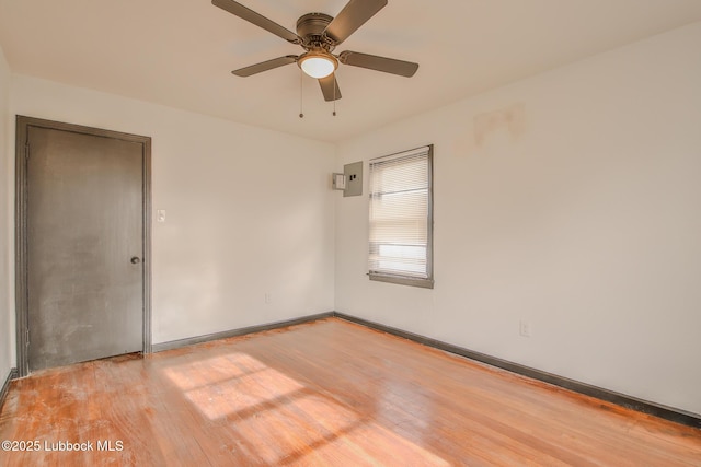 2014 60th St, Lubbock, TX 79412 - unfurnished room featuring light wood finished floors and a ceiling fan
