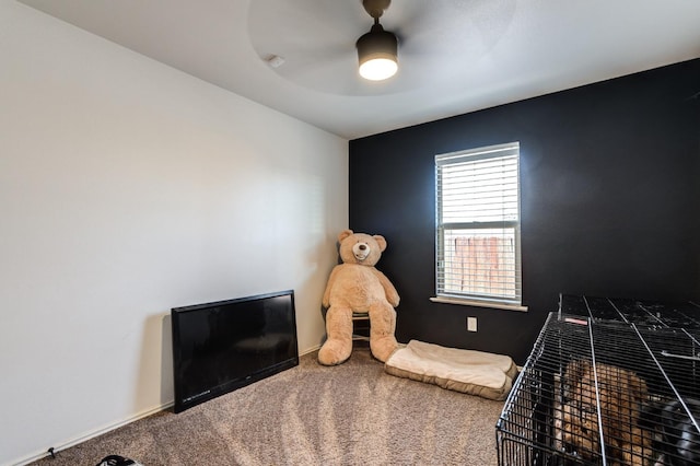 bedroom with ceiling fan and carpet