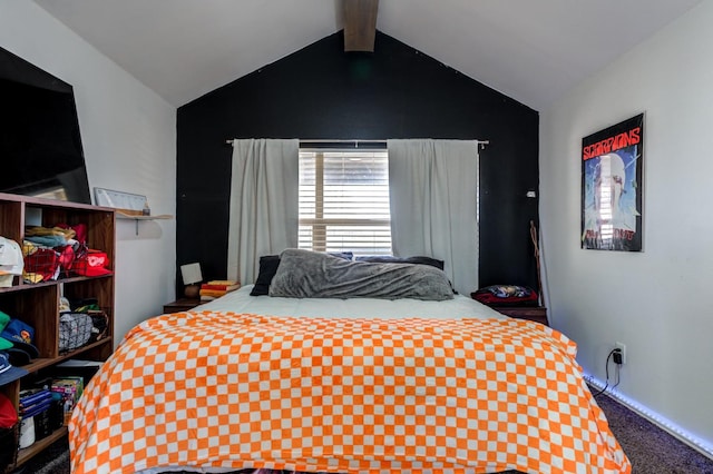 carpeted bedroom featuring lofted ceiling