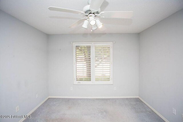 5110 1st Pl, Lubbock, TX 79416 - carpeted spare room with baseboards and ceiling fan