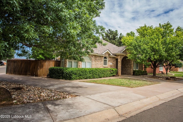 5110 1st Pl, Lubbock, TX 79416 - obstructed view of property with brick siding