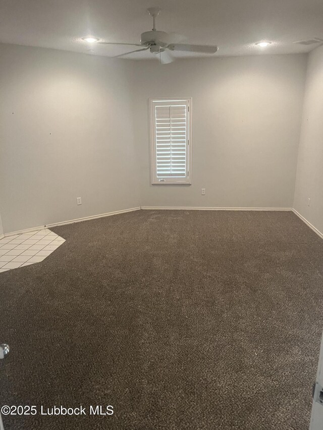 5110 1st Pl, Lubbock, TX 79416 - carpeted empty room with a ceiling fan and baseboards