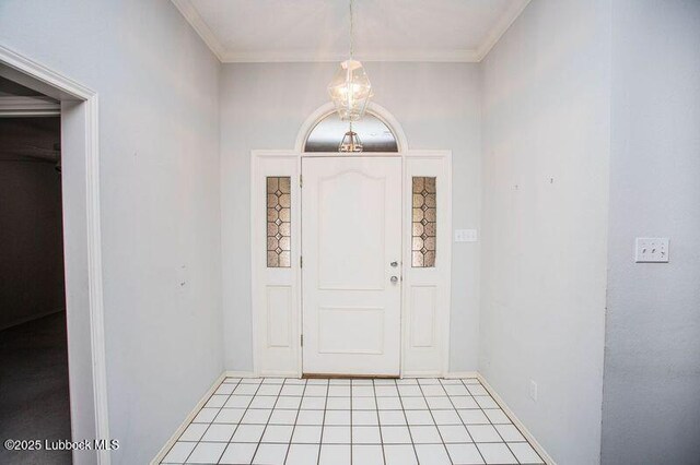 5110 1st Pl, Lubbock, TX 79416 - tiled entryway featuring baseboards and ornamental molding