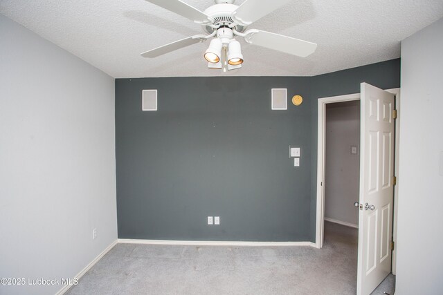 5110 1st Pl, Lubbock, TX 79416 - spare room featuring carpet floors, a ceiling fan, baseboards, and a textured ceiling