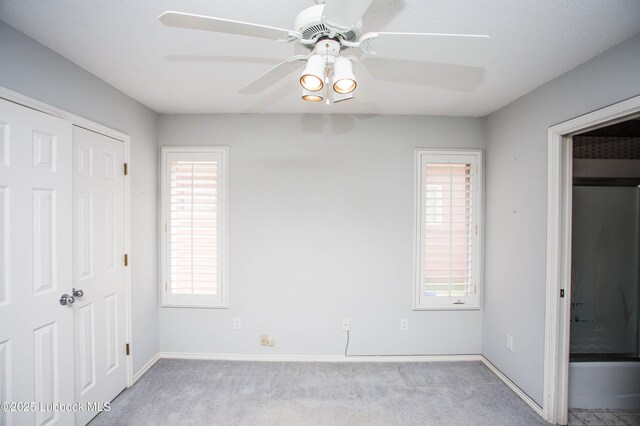 5110 1st Pl, Lubbock, TX 79416 - unfurnished bedroom with carpet flooring, baseboards, ceiling fan, and a closet