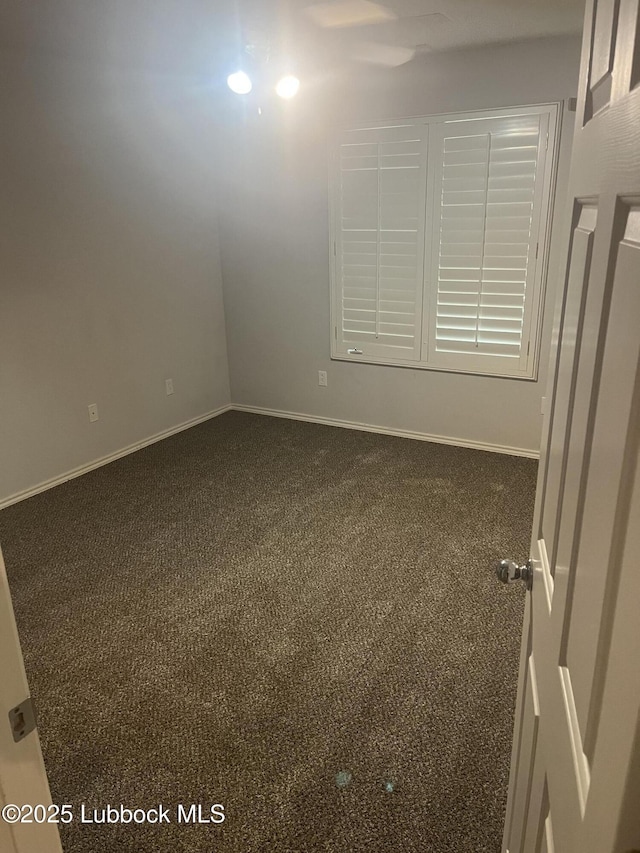 5110 1st Pl, Lubbock, TX 79416 - carpeted empty room with baseboards