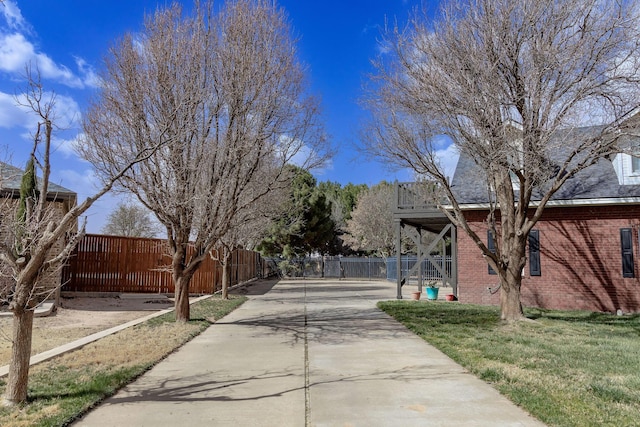 exterior space featuring a gated entry and driveway