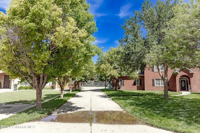 7416 95th St, Lubbock, TX 79424 - view of home's community featuring a yard