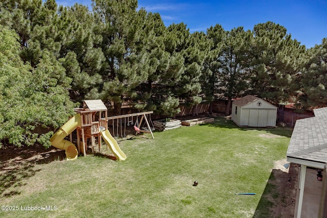 7416 95th St, Lubbock, TX 79424 - view of yard with a shed, a playground, and an outdoor structure