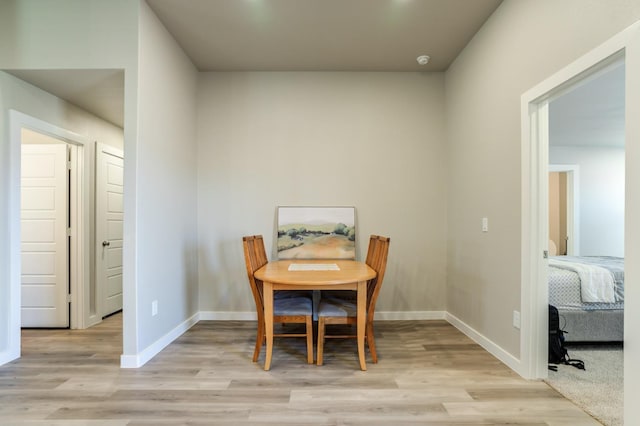 dining room with light hardwood / wood-style floors