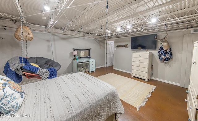 3417 56th St, Lubbock, TX 79413 - bedroom with baseboards and finished concrete floors