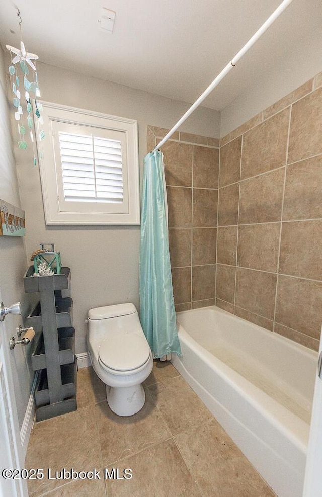 3417 56th St, Lubbock, TX 79413 - bathroom featuring shower / bath combo and tile patterned flooring