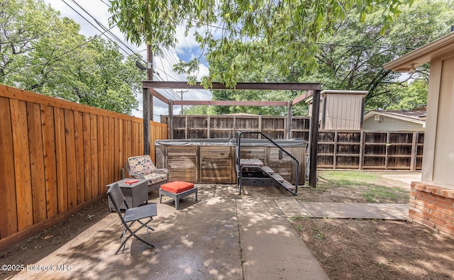 3417 56th St, Lubbock, TX 79413 - fenced backyard with a hot tub and a patio