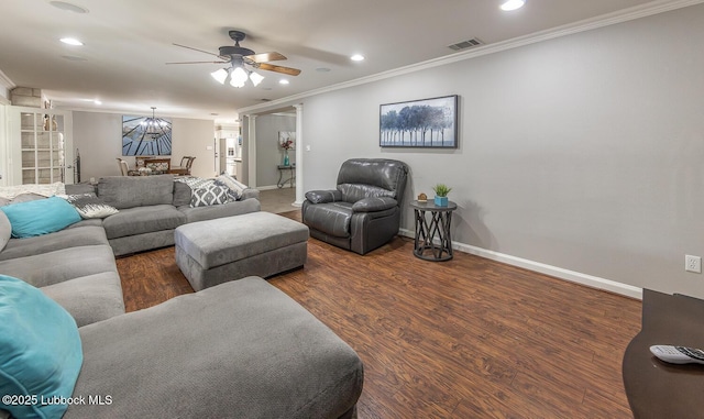 3417 56th St, Lubbock, TX 79413 - living room featuring ornamental molding, recessed lighting, ceiling fan, wood finished floors, and a chandelier