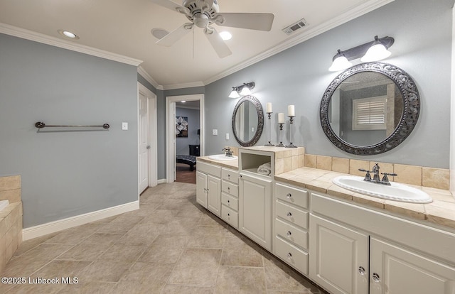 3417 56th St, Lubbock, TX 79413 - ensuite bathroom featuring double vanity, ceiling fan, and crown molding
