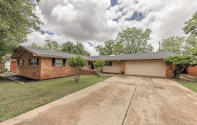 3417 56th St, Lubbock, TX 79413 - ranch-style house with brick siding, an attached garage, driveway, and a front yard