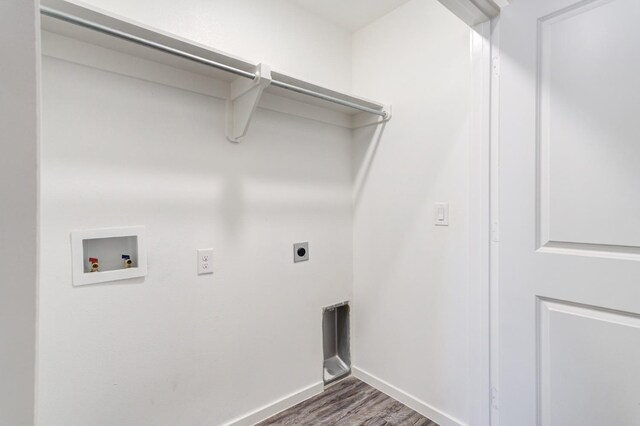 laundry area with washer hookup, electric dryer hookup, and dark hardwood / wood-style floors