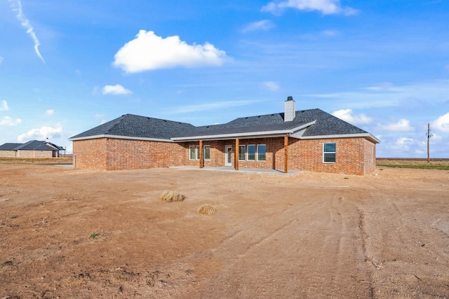 view of front of home featuring a patio area