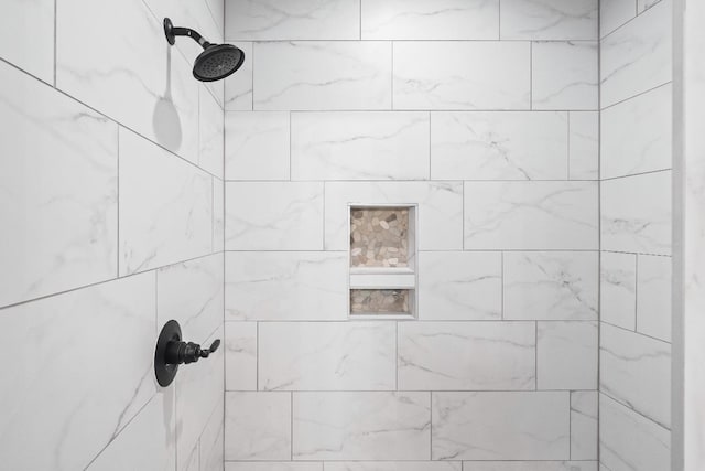 details featuring a tile shower