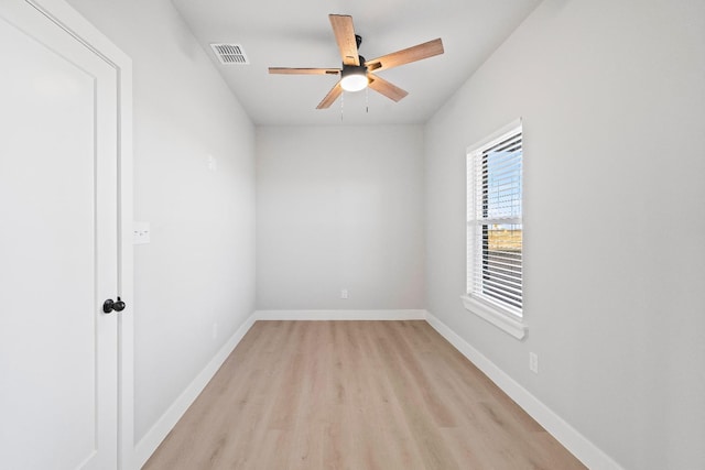 unfurnished room with ceiling fan and light hardwood / wood-style flooring