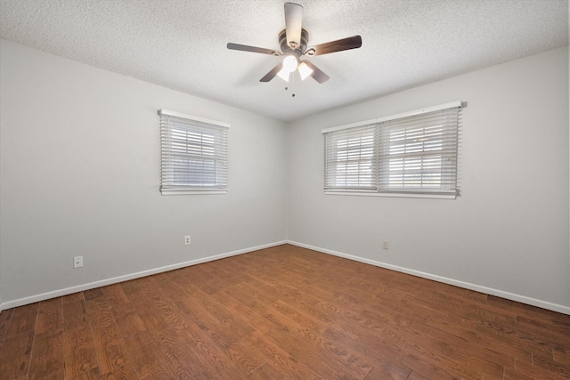 3808 27th St, Lubbock, TX 79410 - unfurnished room with a ceiling fan, healthy amount of natural light, a textured ceiling, and wood finished floors